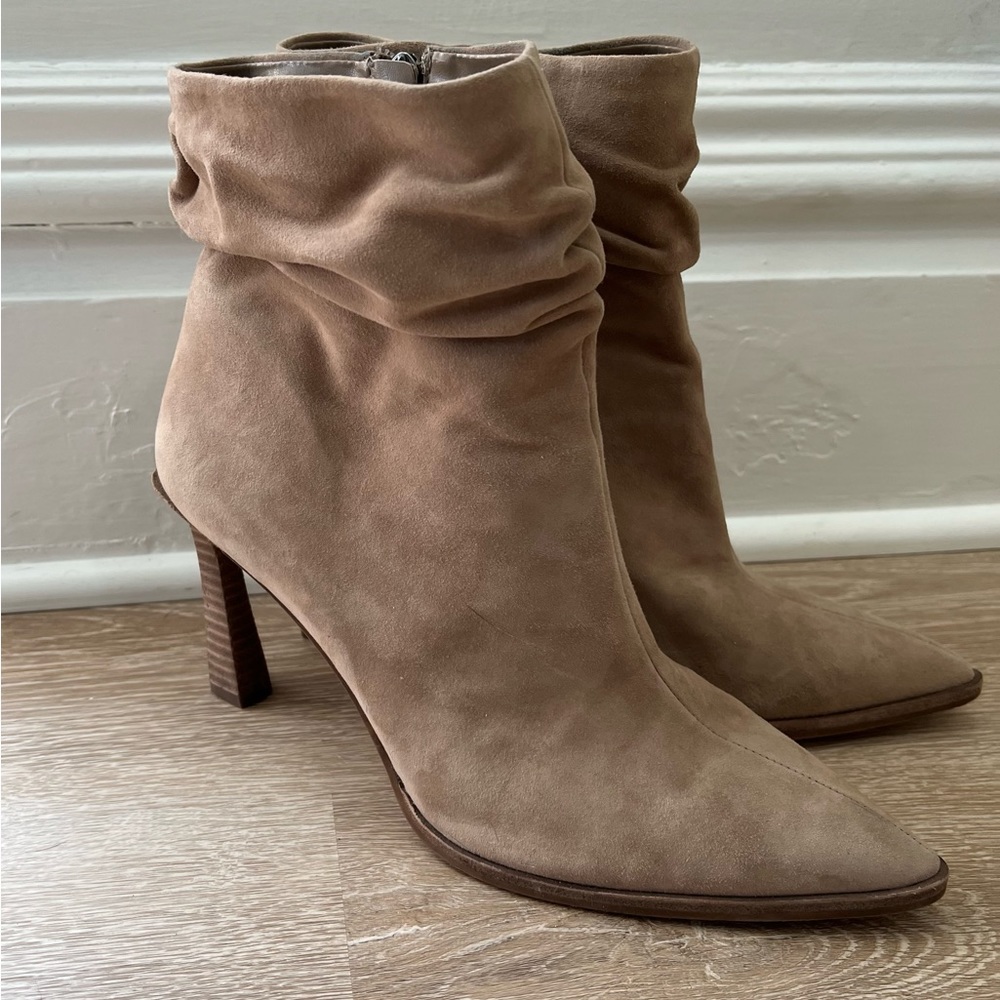 Vince Camuto ankle length boots with flared heel. Great Condition